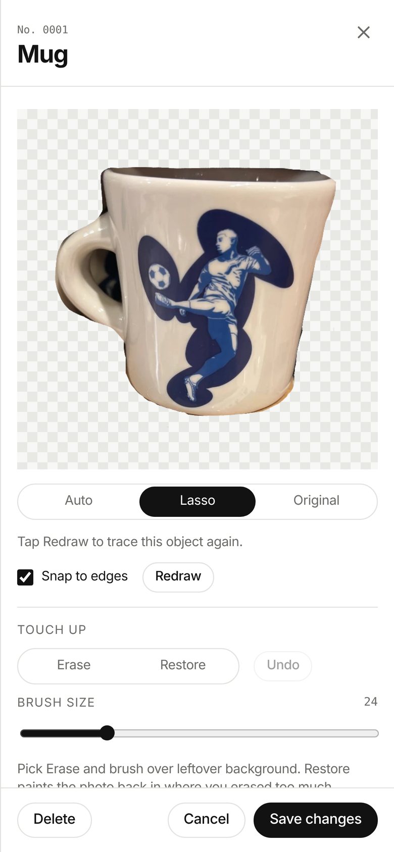 The mug's cut-out tools on a phone